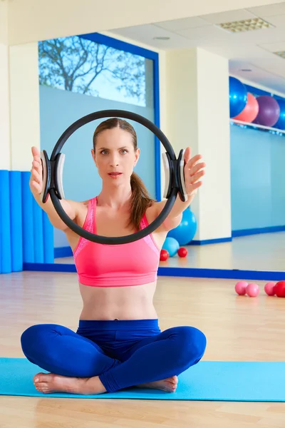 Pilates woman magic ring hands exercise — Stok fotoğraf