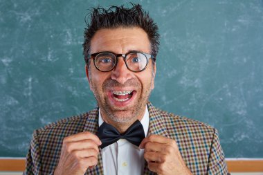 Nerd silly retro man with braces funny expression clipart