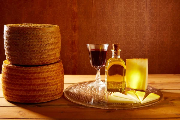 Manchego cheese from Spain in wooden table — Stock Photo, Image