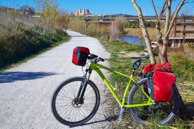 cycling tourism bike in ribarroja Parc de Turia clipart