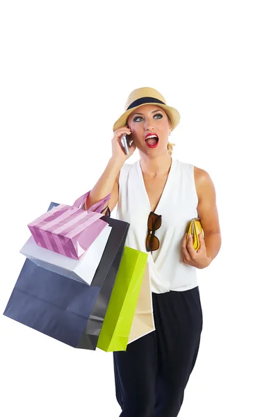 Blond shopaholic woman bags and smartphone — Stock Photo, Image