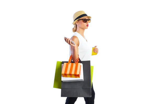 Loira shopaholic mulher sacos e smartphone — Fotografia de Stock