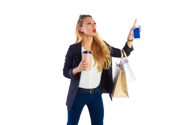 Loira shopaholic mulher sacos e smartphone — Fotografia de Stock