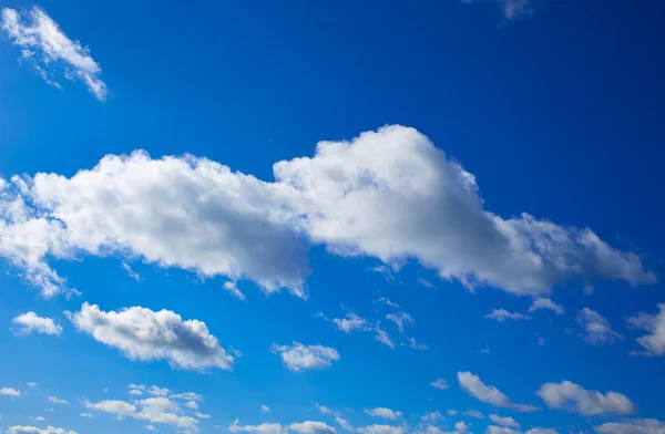 Blue sky with clouds in a summer day — Stock Photo, Image