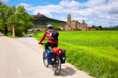 Castrojeriz biker on the way of Saint James clipart