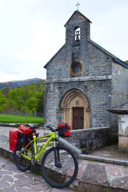 Roncesvalles begin of Way of Sain James biking clipart
