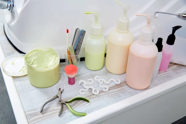 Pedicure treatment products in nails salon — Stock Photo, Image