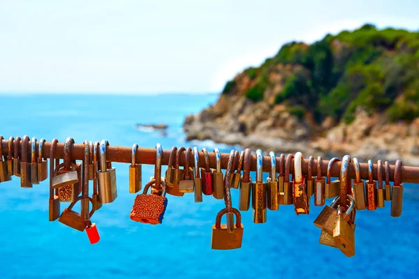 Costa Brava beach Lloret de Mar padlocks in a row — Stock Photo, Image