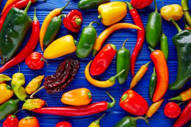 Mexican hot chili peppers colorful mix clipart