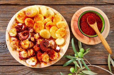 Pulpo a Feira with octopus potatoes gallega style clipart