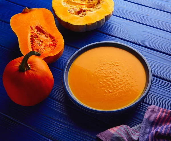 Pumpkin soup cream on wood — Stock Photo, Image