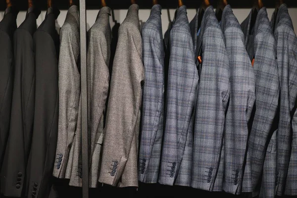 Jackets hanging in a men\'s clothing store