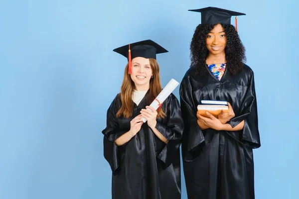 Two Girls Posing Take Photo Black Gowns Hold Diploma Certificate — Zdjęcie stockowe