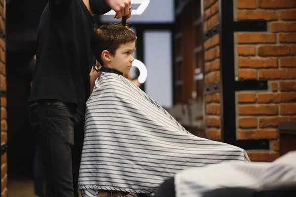 Little Cute Boy Sits Hairdresser Stylist Schoolchild Getting Hair Cut — Stock Photo, Image