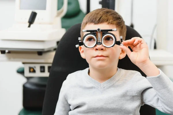 Young Boy Undergoing Eye Test Spectacles Medical Clinic Royalty Free Stock Photos