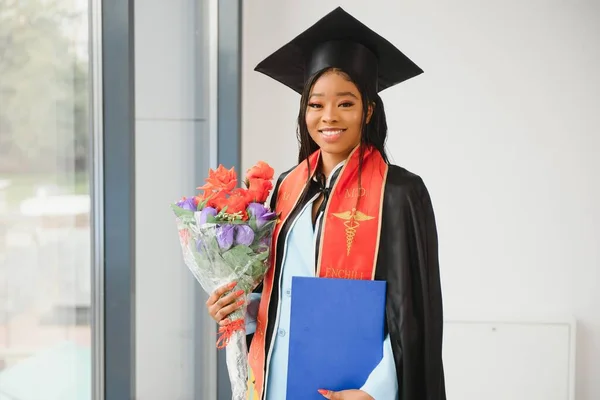 African American Graduate Holding Diploma — Stock Photo, Image