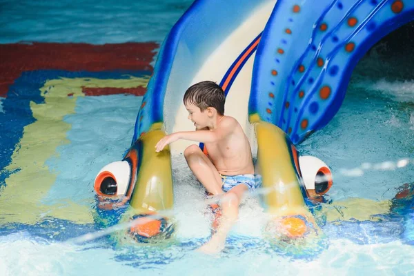 Stock image Boy having fun in aqua park