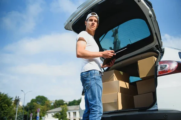 Young Delivery Man Checking List Clipboard Car — Stock Photo, Image