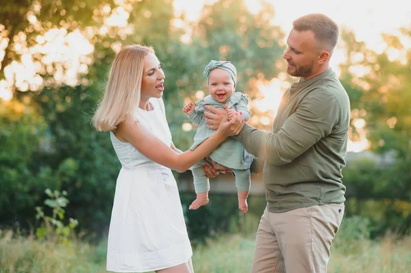 Young Beautiful Family Little Daughter Hug Kiss Walk Nature Sunset — Stock Photo, Image