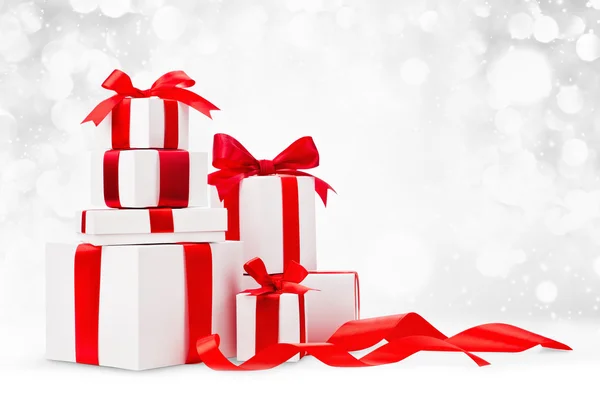 Vánoční dárky s červeným luky — Stock fotografie