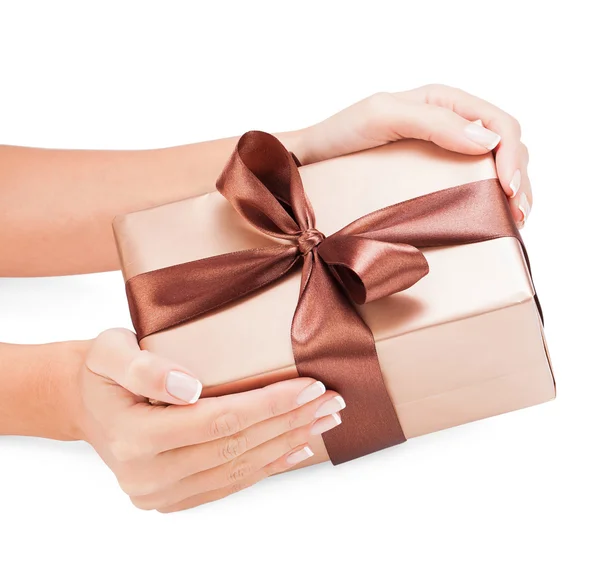 Small gift in women hands — Stock Photo, Image