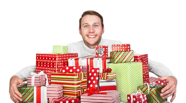 Junger Mann mit Geschenken — Stockfoto