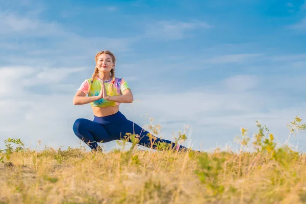 Young Beautiful Girl Multicolored Tracksuit Performs Physical Exercises Stretch Muscles — Zdjęcie stockowe