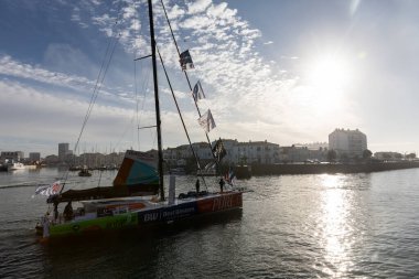 LES SABLES D'OLONNE, FRANCE - NOVEMBER 08, 2020: Romain Attanasio boat (Pure - Best Western) in the channel for the start of the Vendee Globe 2020 on November 08,2020. in Les Sables d'Olonne, France.