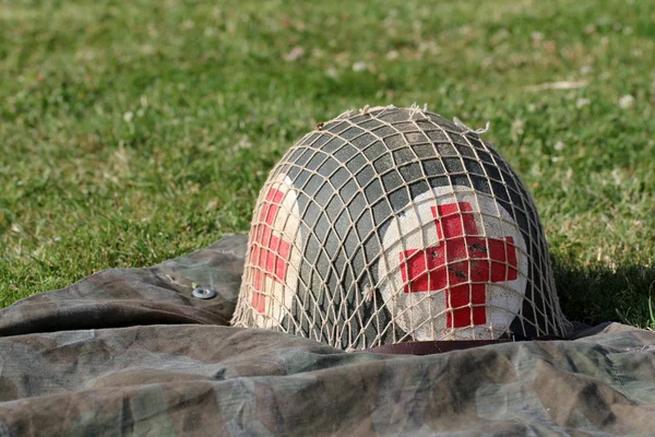 Red cross military helmet — Stock Photo, Image