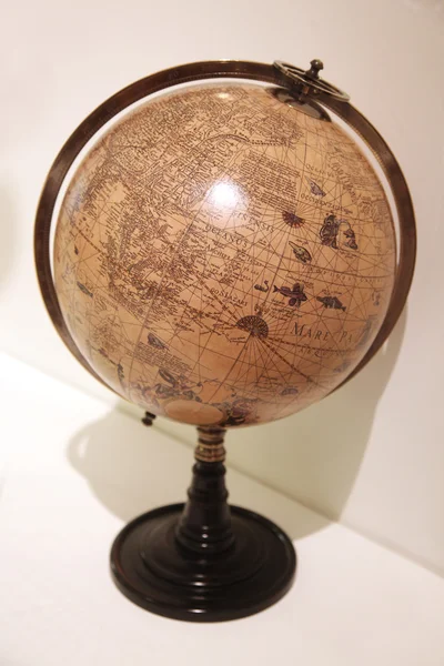 old brown globe on white background