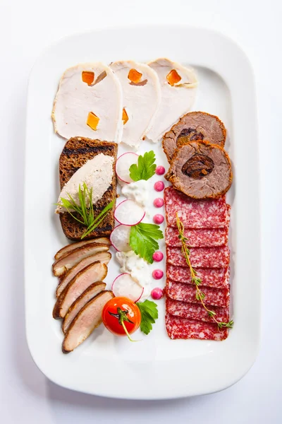 Dish with meat appetizers — Stock Photo, Image