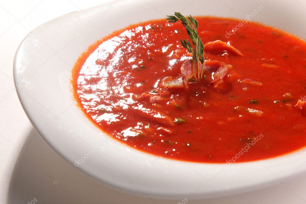 tomato soup with Bacon in plate