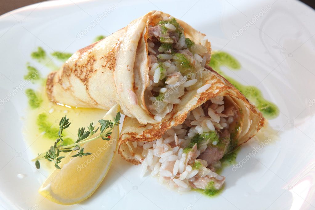 pancakes with rice and tuna on plate