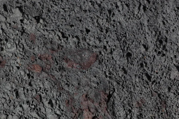 Black lava stones texture — Stock Photo, Image
