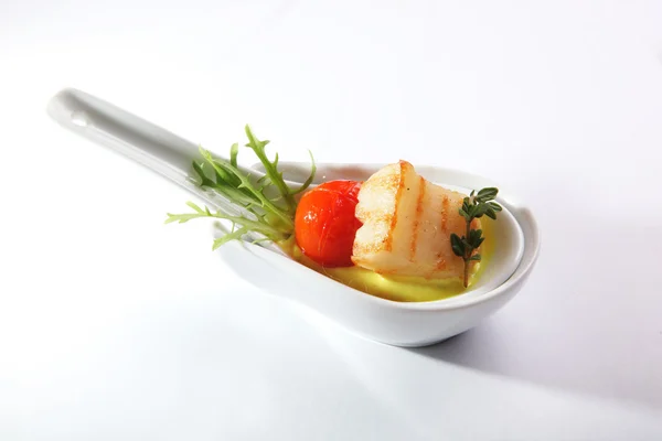 appetizer with cherry tomatoes and cheese buffet on white background