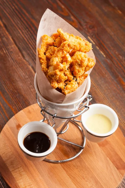 Breaded Chicken Pieces Paper Bag Wooden Table — 스톡 사진