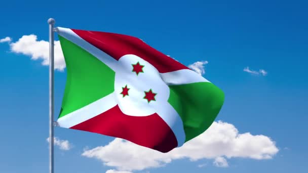 Burundi bayrağı sallayarak üzerinde mavi bir bulutlu gökyüzü — Stok video