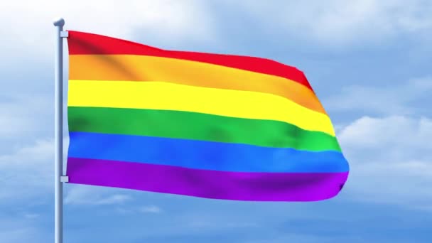 Bandeira LGBT acenando sobre um céu azul nublado — Vídeo de Stock