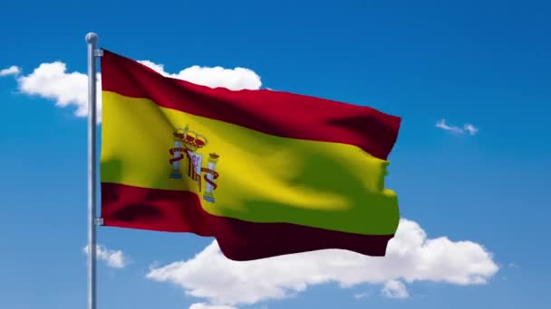 Spanish flag waving over a blue cloudy sky — Stock Video