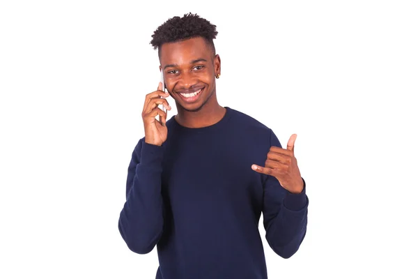 Jonge African American man die dat een smartphonemaking duimschroef opwaarts — Stockfoto