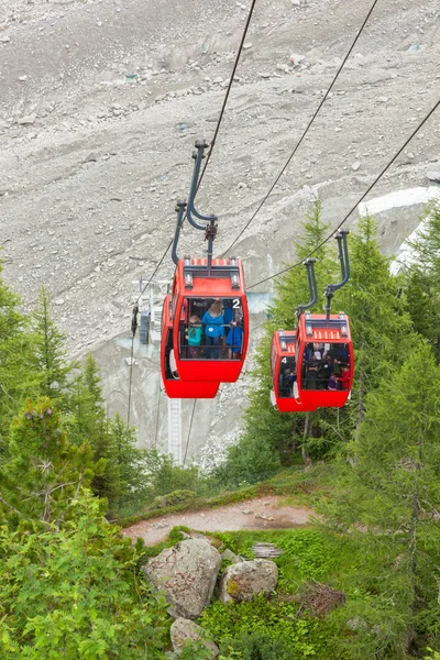 Ice Sea - "Mer de glaces" cable car taking to the ice cavern in — Stock Photo, Image