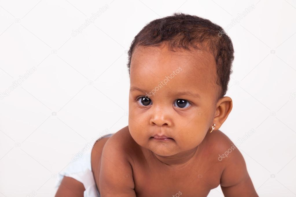 Adorable african american baby girl  lying down