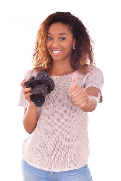 African American photographer holding a dslr camera making thumb — Stock Photo, Image