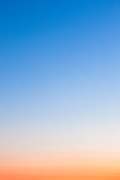 Clear orange and blue sunset sky — Stock Photo, Image