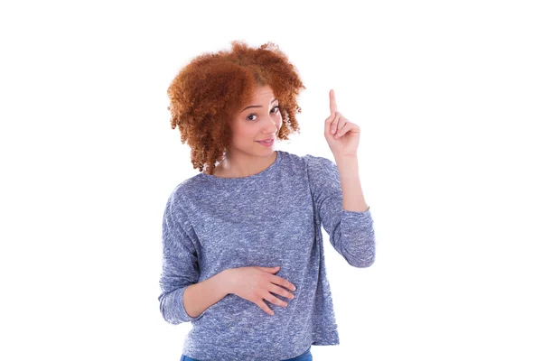 Unga afroamerikanska tonårsflicka pekande finger upp — Stockfoto