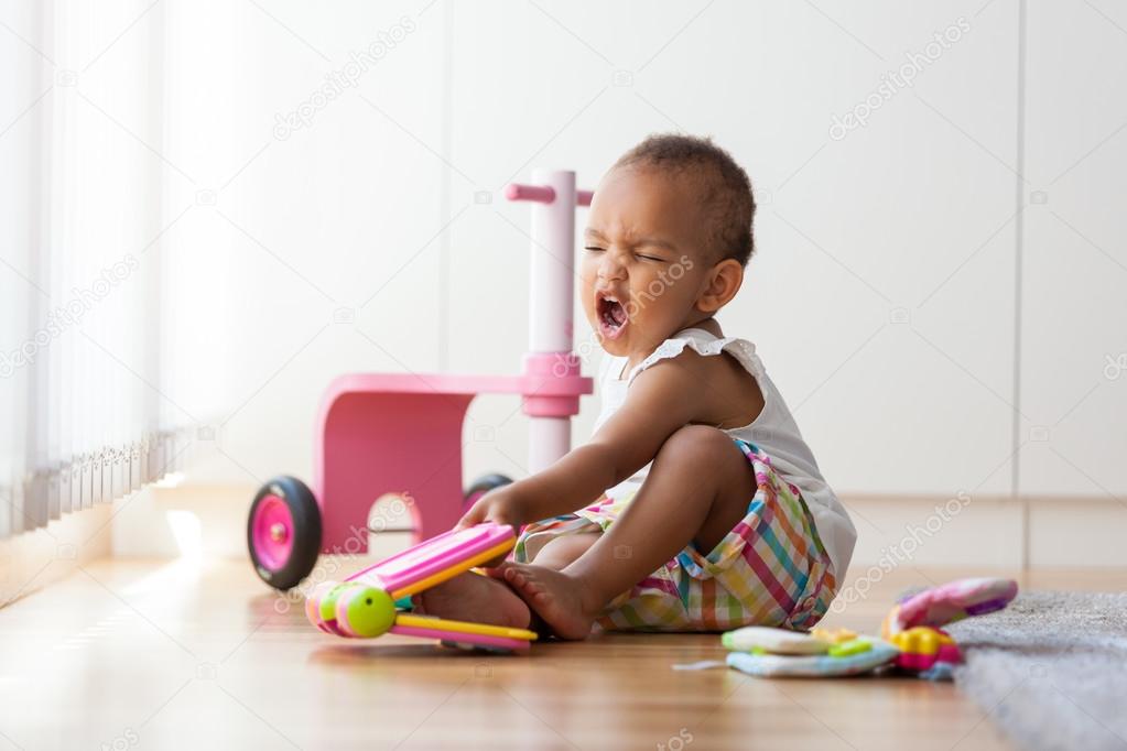 little African American little girl sitting