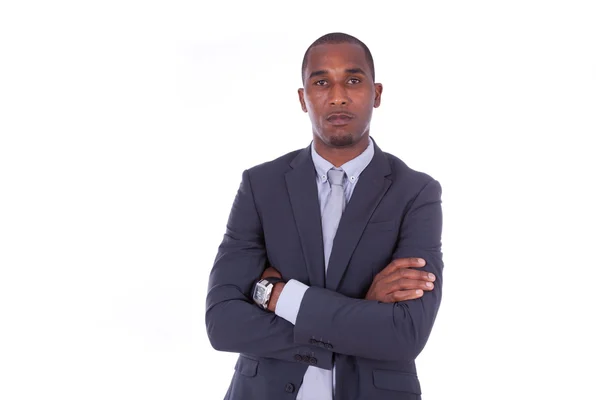 Unhappy African american business man with folded arms over whit — Stock Photo, Image