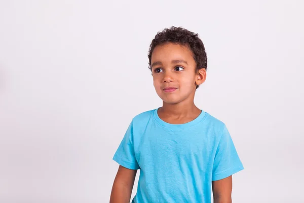 Portrait of a cute little African American boy smiling — Stock Photo, Image