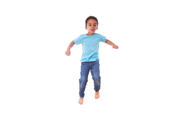 Porträtt av en söt liten amerikansk pojke hoppa på en spårvagn — Stockfoto