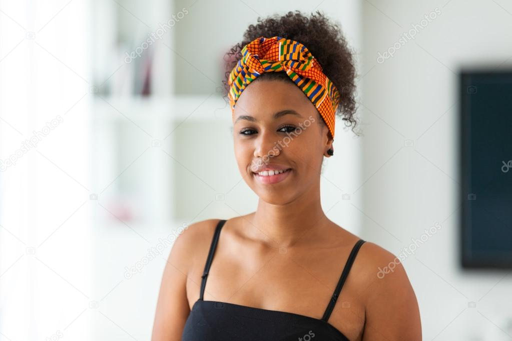Beautiful African American woman wearing an african head scarf -